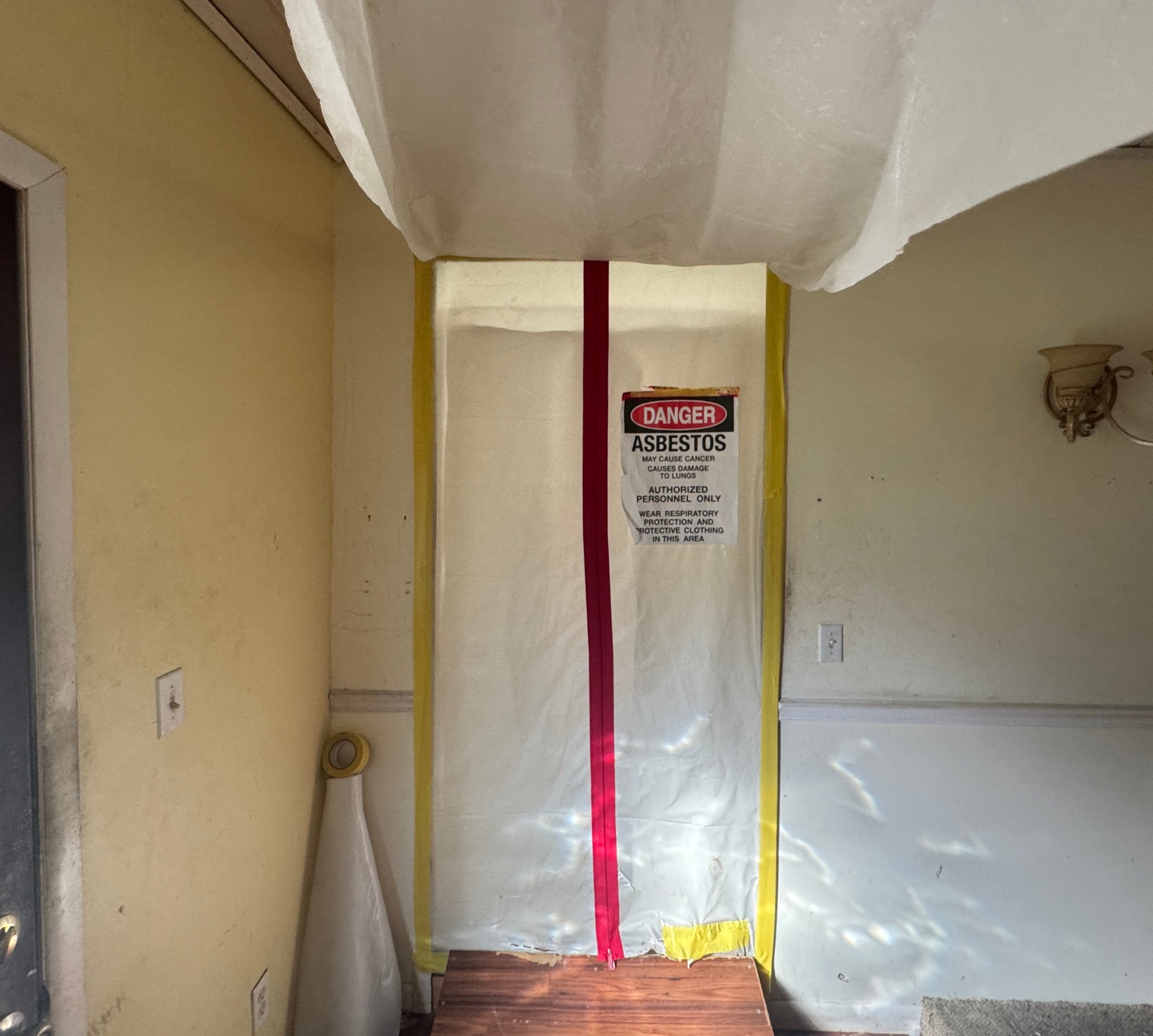 Asbestos Containment and Hazard Signage, Indicating Active Asbestos Work Abatement