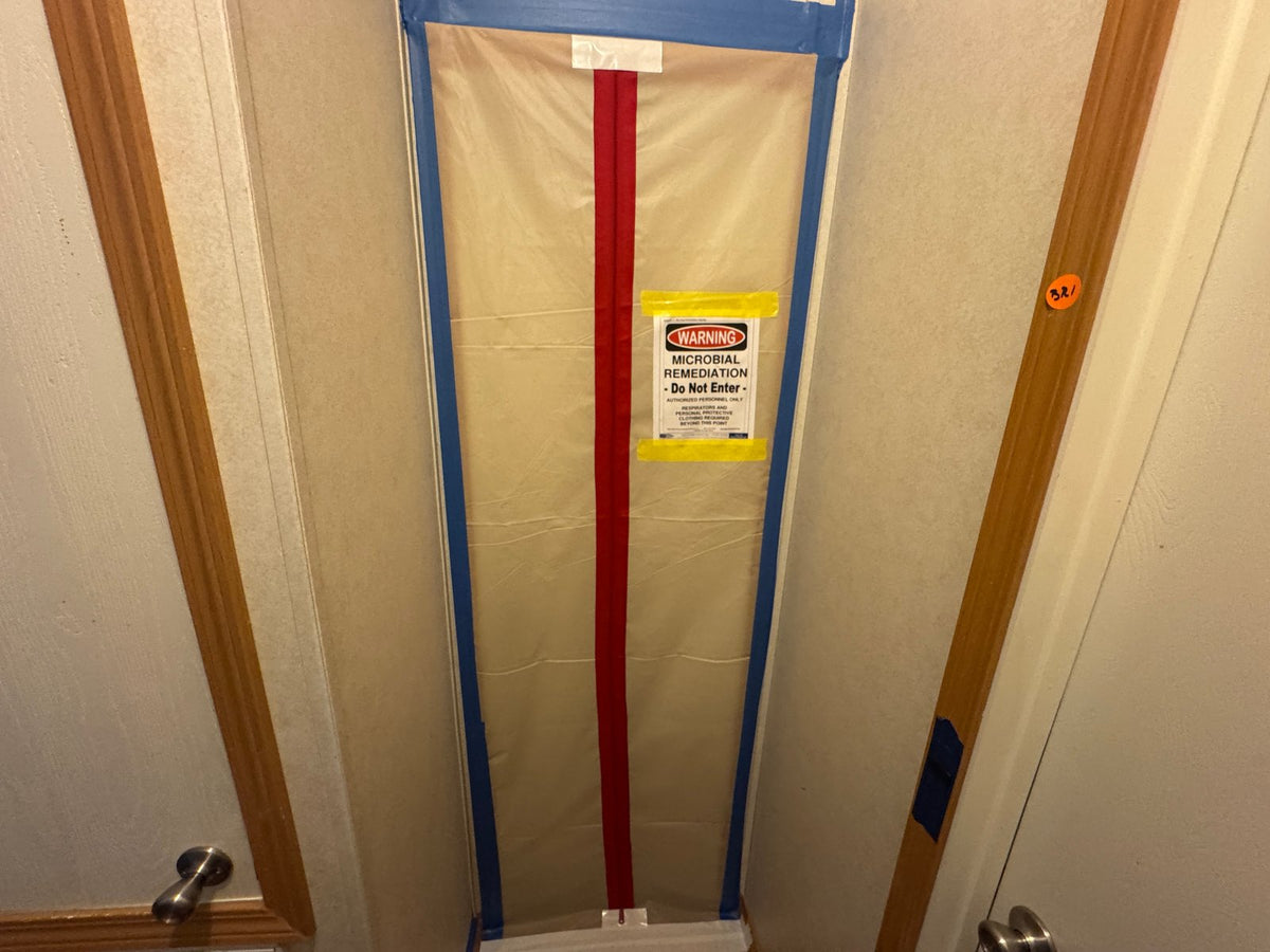 Mold remediation and restoration work inside a home