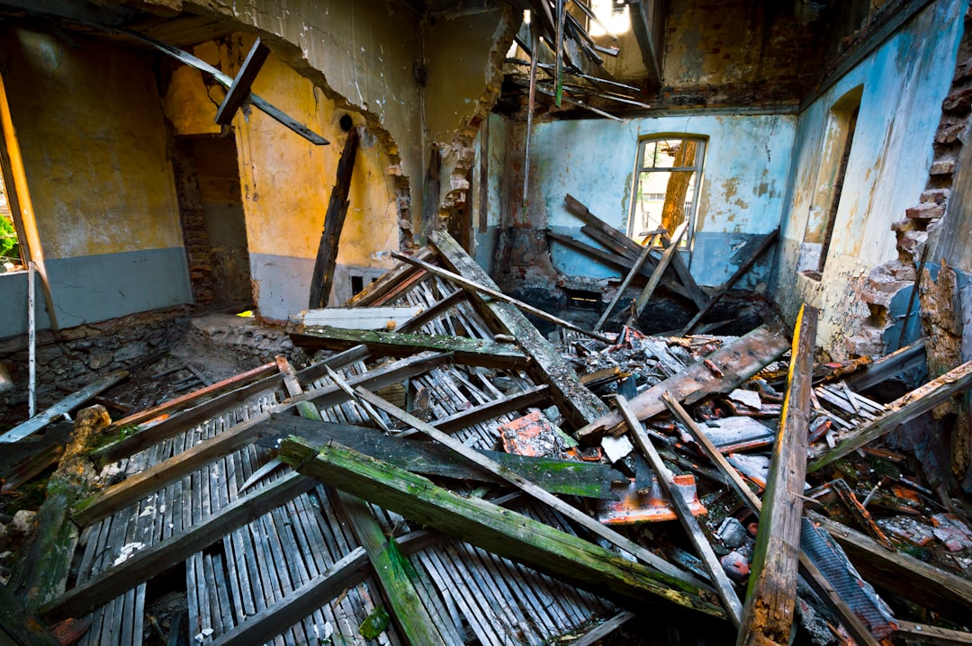 Interior of a destroyed building with debris everywhere.